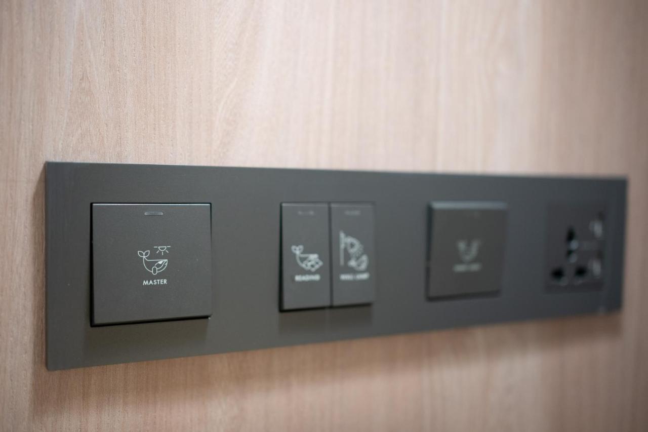 Panwaburi Beachfront Resort - Sha Extra Plus Экстерьер фото A wall-mounted light switch